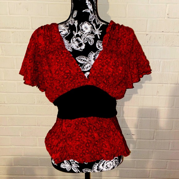Trashy Diva Tops - Trashy Diva show off top. Zip up back with 2 fishhook clasps in back. Open back.